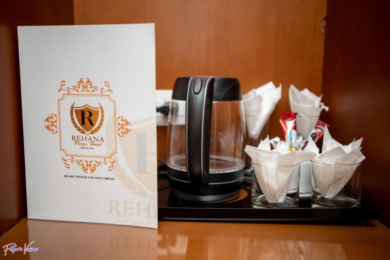קהיר Rehana Plaza Hotel מראה חיצוני תמונה A tea and coffee making facility in a hotel room